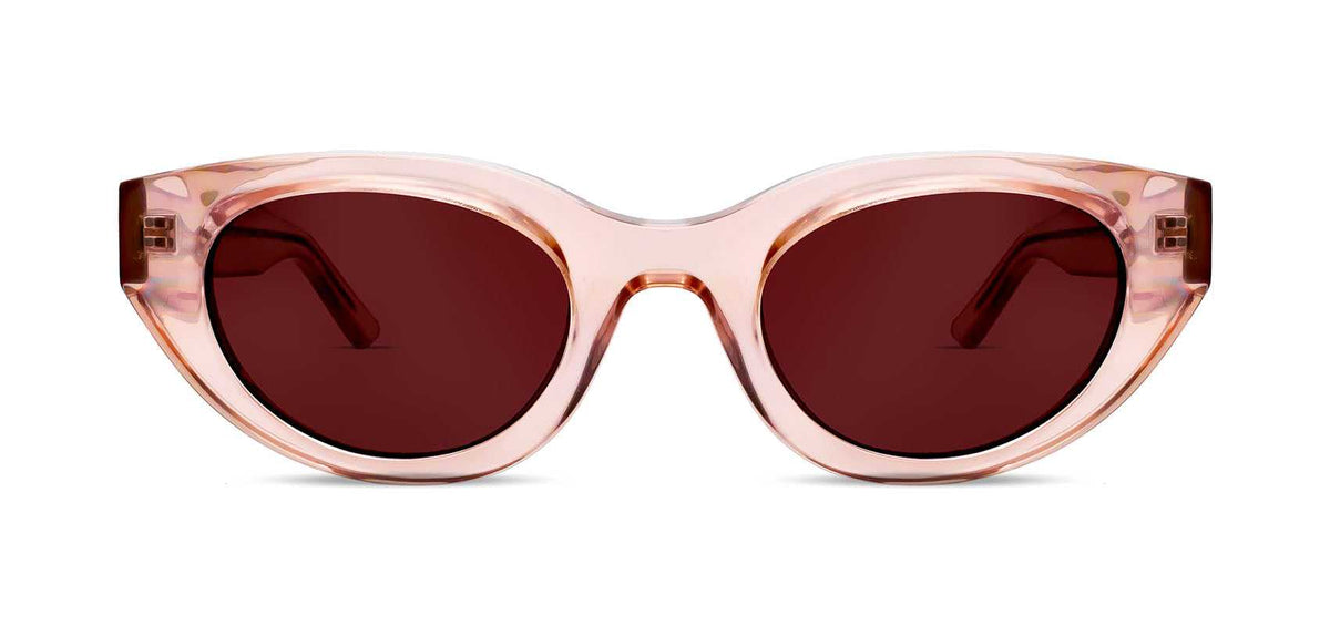 Cat-eye sunglasses with pink acetate frame and dark tinted lenses