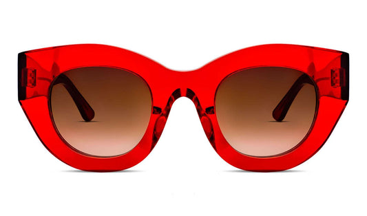 Oversized red cat-eye sunglasses with gradient brown lenses