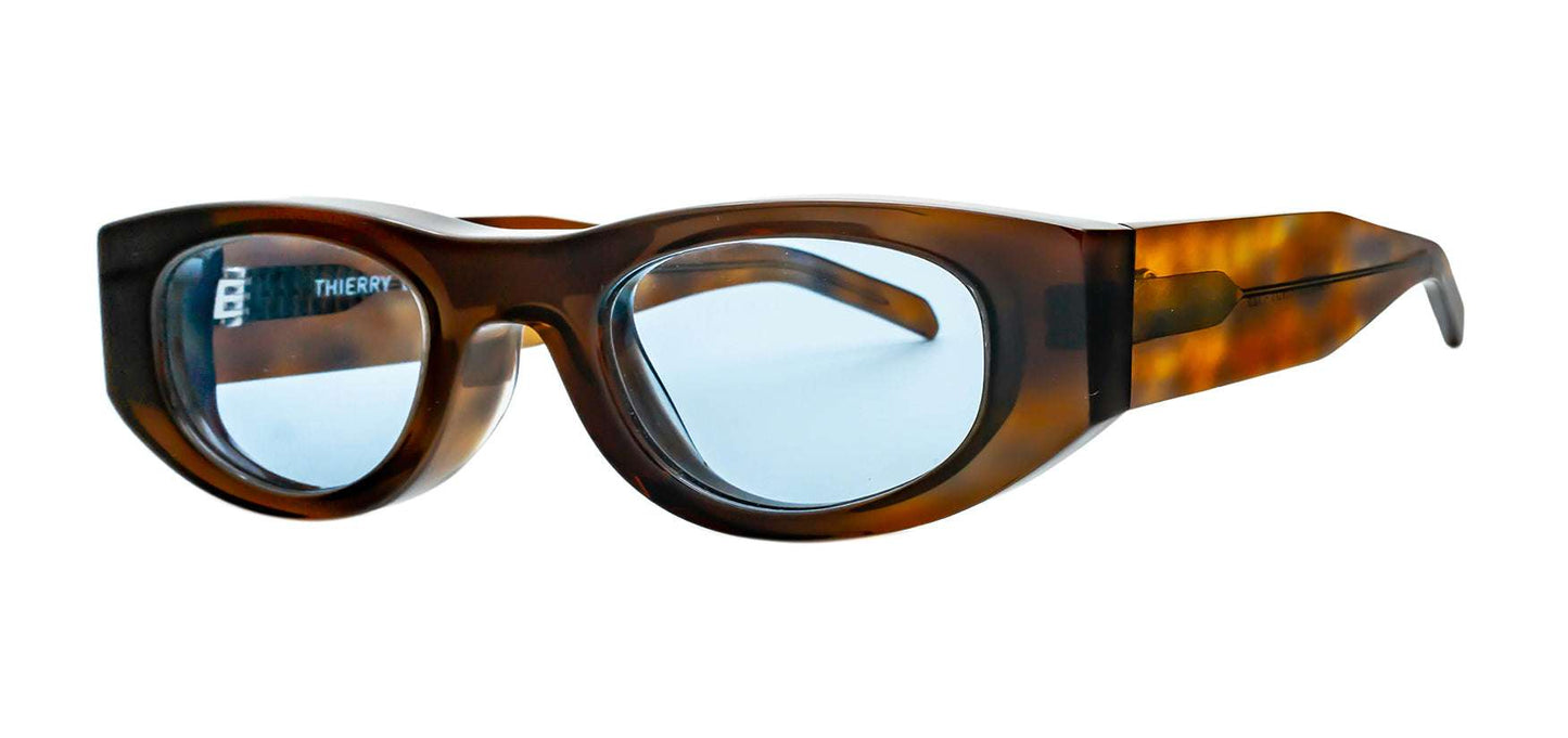 thierry-lasry-mastermindy-brown-pattern-sunglasses-tinted-light-blue-lenses-side-view.jpg