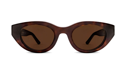 Cat-eye sunglasses with tortoiseshell acetate frame and dark tinted lenses
