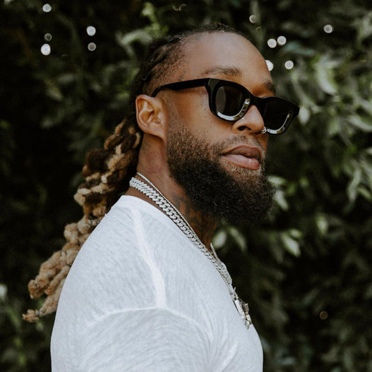 Ty Dolla $ign wearing the RHUDE x THIERRY LASRY “RHODEO”
