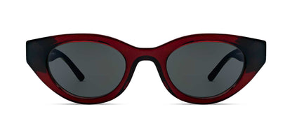 Cat-eye sunglasses with red acetate frame and dark tinted lenses