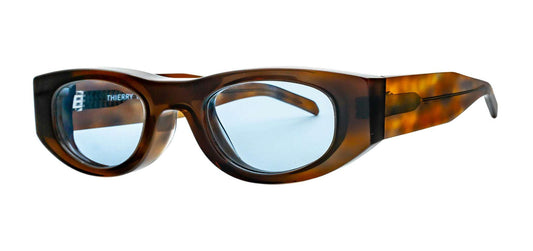 thierry-lasry-mastermindy-brown-pattern-sunglasses-tinted-light-blue-lenses-side-view.jpg