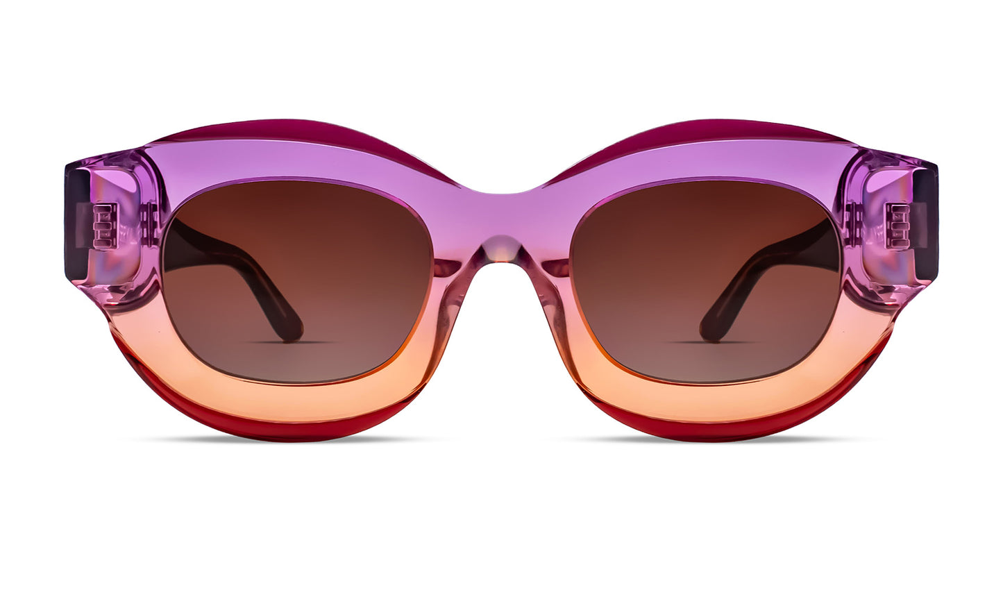 Designer round sunglasses in translucent gradient purple‑orange acetate