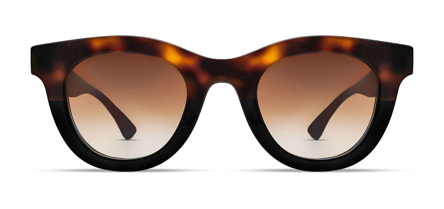 Thierry Lasry Consistency soft cat-eye sunglasses in black and tortoiseshell gradient acetate, handcrafted in Italy, optimal UV protection