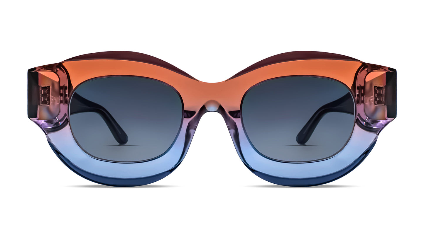 Designer round sunglasses in translucent gradient orange-blue acetate
