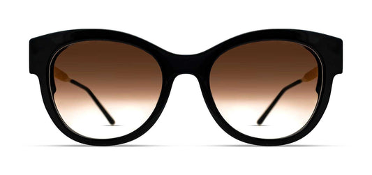 Black cat-eye sunglasses with gradient brown lenses and silver metal temples