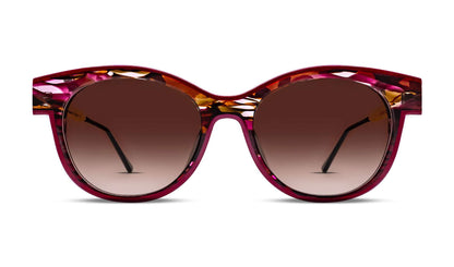 Thierry Lasry CLINGY cat‑eye sunglasses in brown/pink mosaic acetate with gold metal temples, handmade in France.