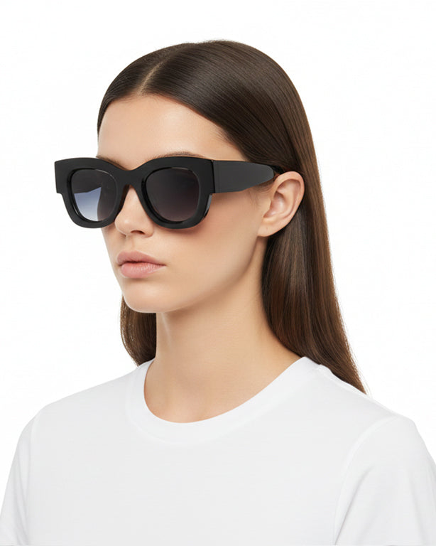 Thierry Lasry CONFESSY statement sunglasses showing strong rectangular geometry and substantial acetate