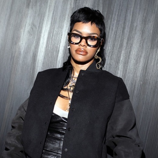 Teyana Taylor wearing the RHUDE x THIERRY LASRY “RHODEO”