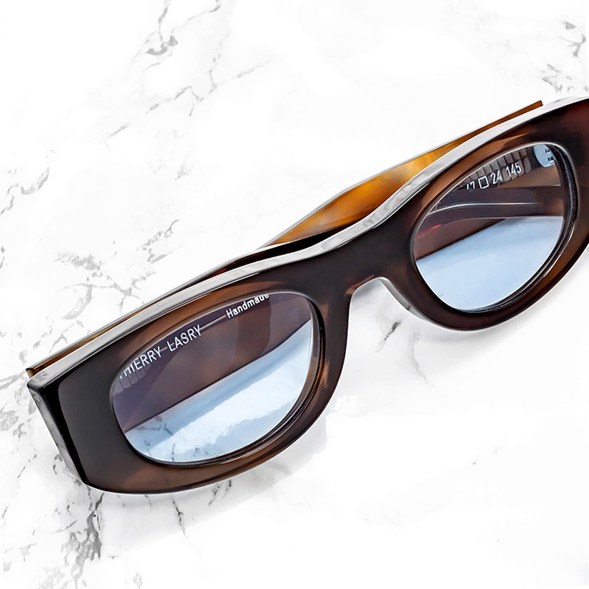 thierry-lasry-mastermindy-brown-pattern-sunglasses-tinted-light-blue-lenses.jpg