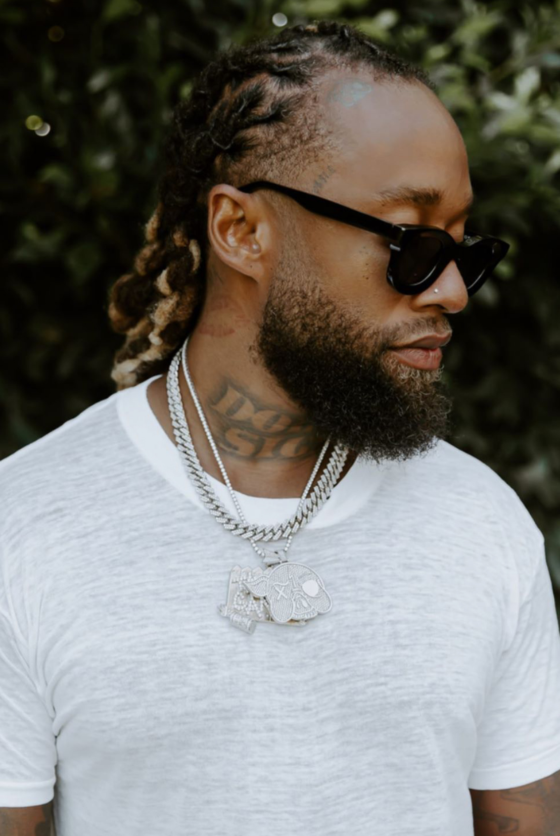 Ty Dolla $ign wearing the RHUDE x THIERRY LASRY “RHODEO”
